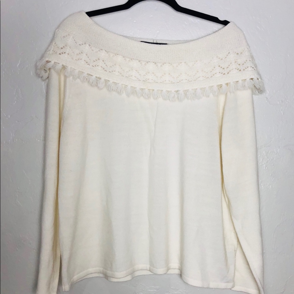 scoop neck cream color sweater with small tassels